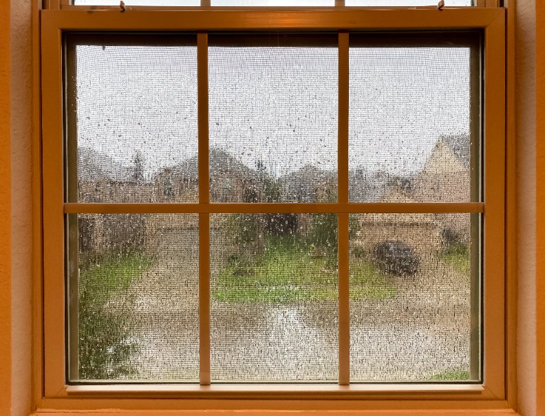 How Security Window Films Protect Your Home During a Storm